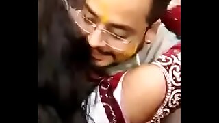 Cute Indian bride kissing publicly